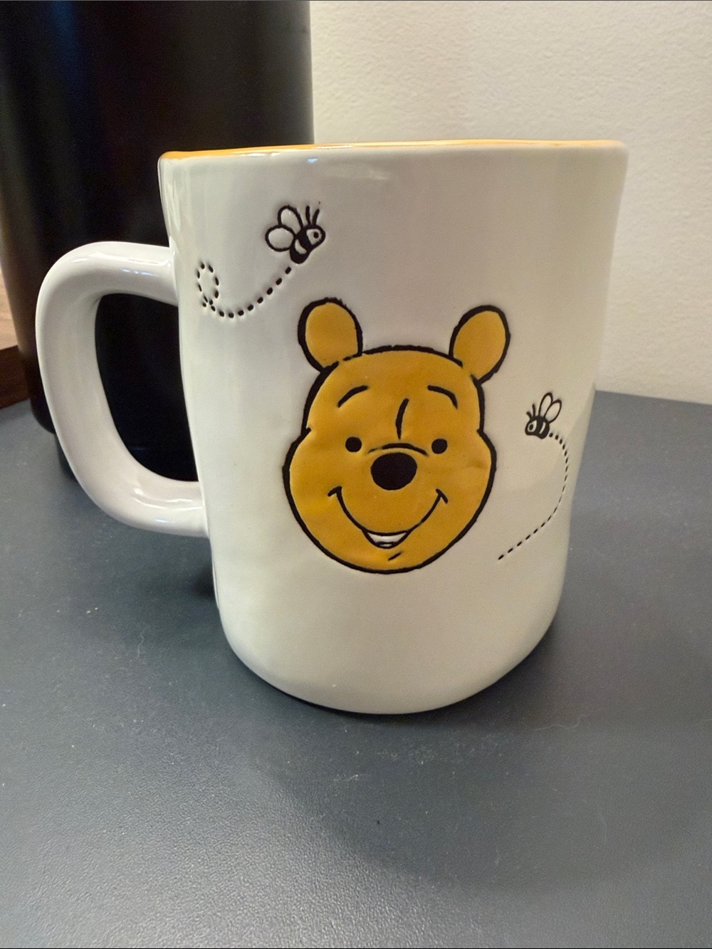 Rae Dunn White Ceramic Mug with Yellow Character Face